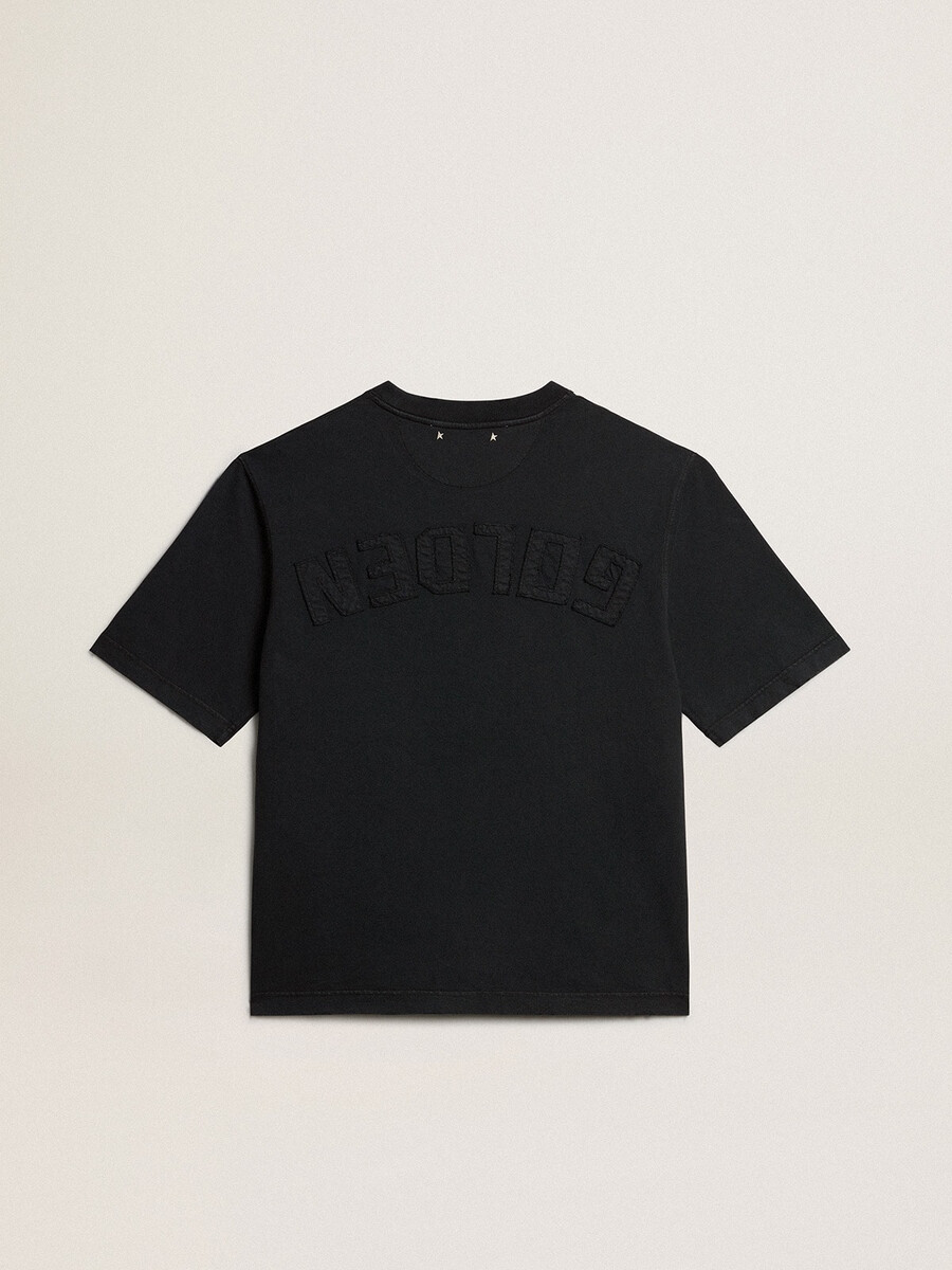背面にリバースロゴが入ったウォッシュドブラックのtシャツ - ジャージーカプセル