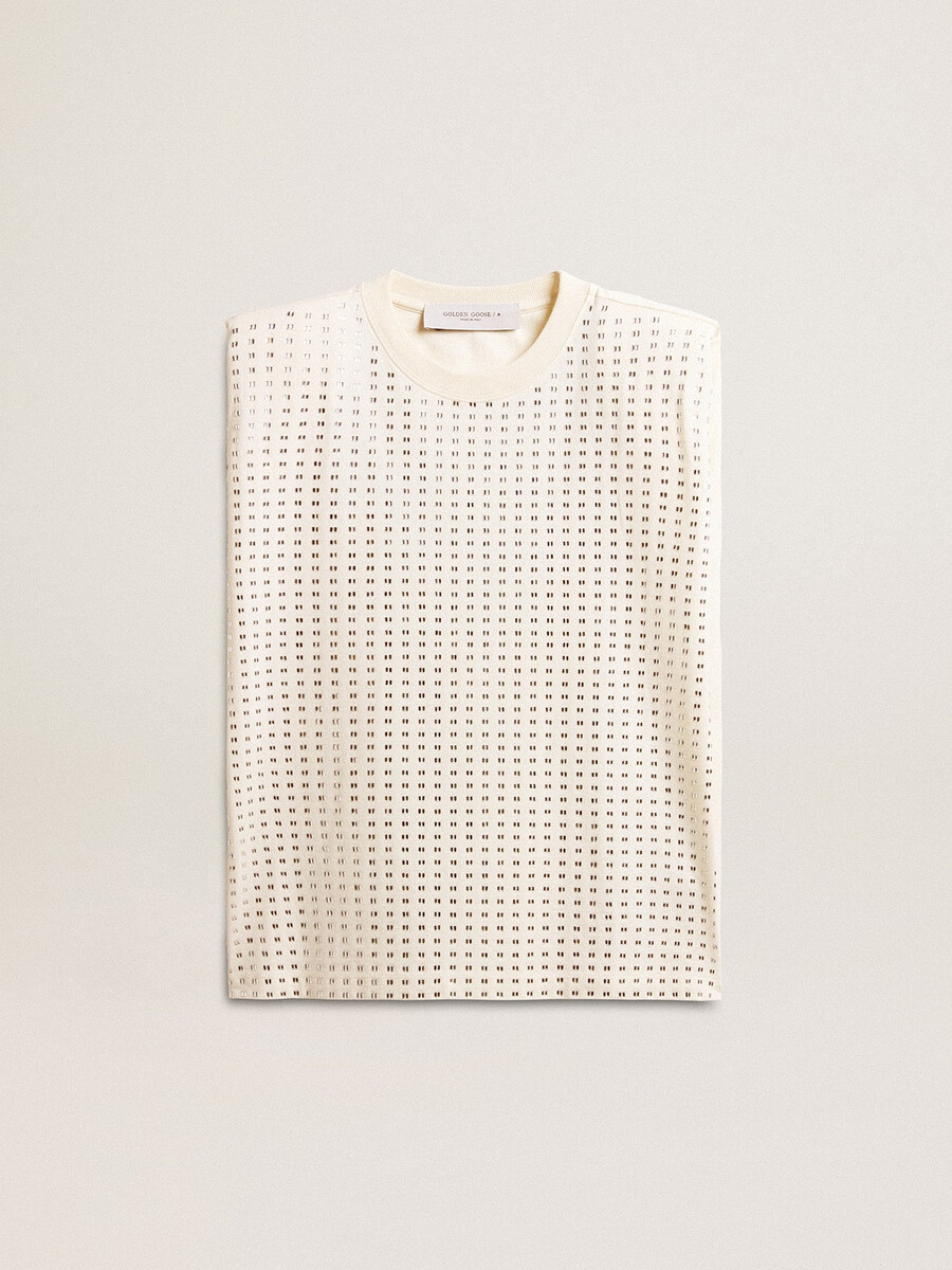 クリスタルで装飾された古びた白いノースリーブtシャツ